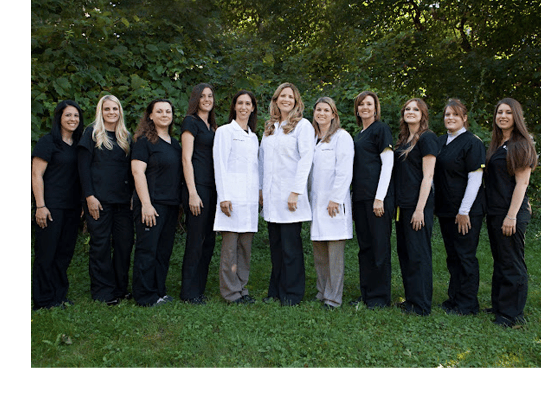 a group of people posing for a photo