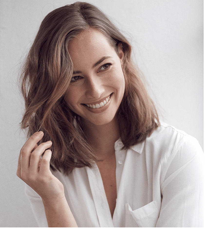 a woman smiling for the camera